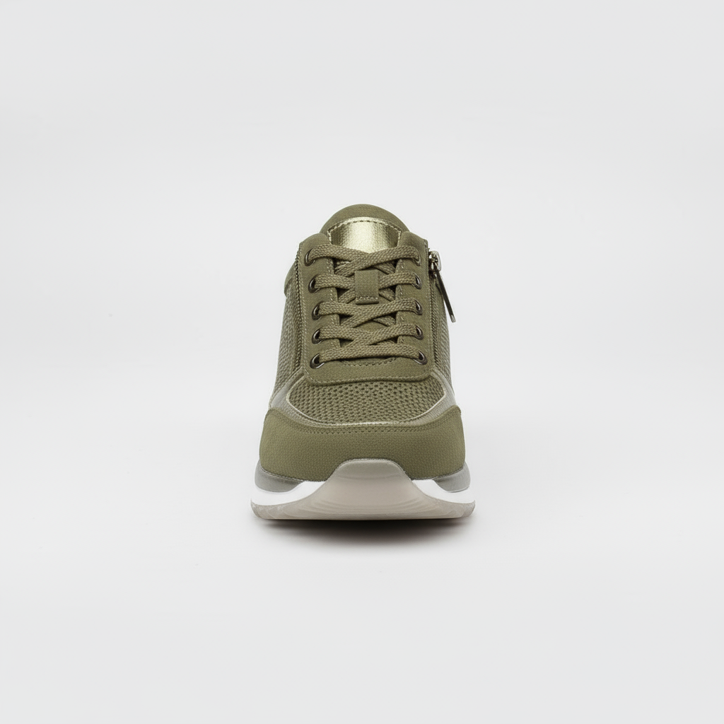 Green sneaker on a light gray background