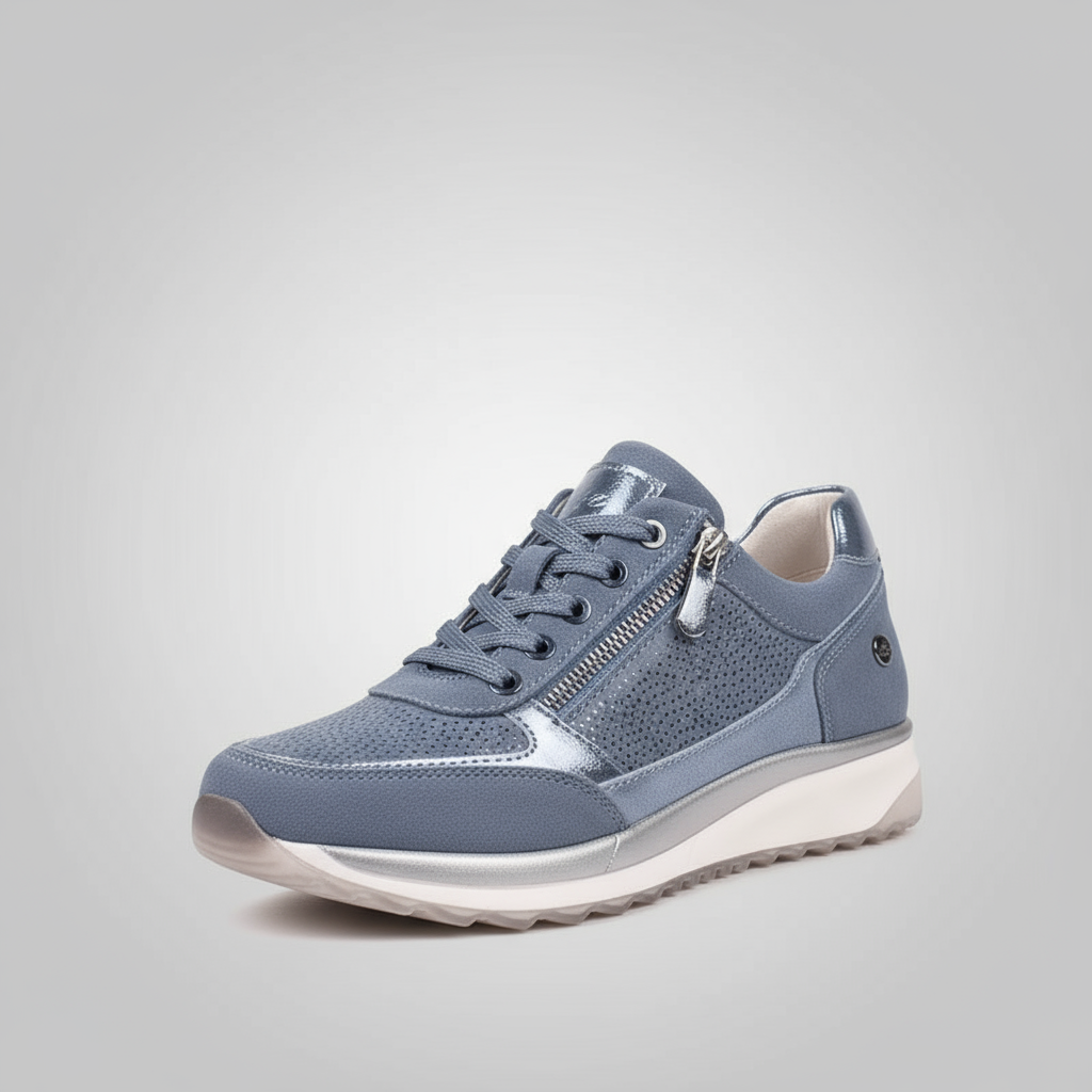 Blue sneaker with white sole on a light gray background