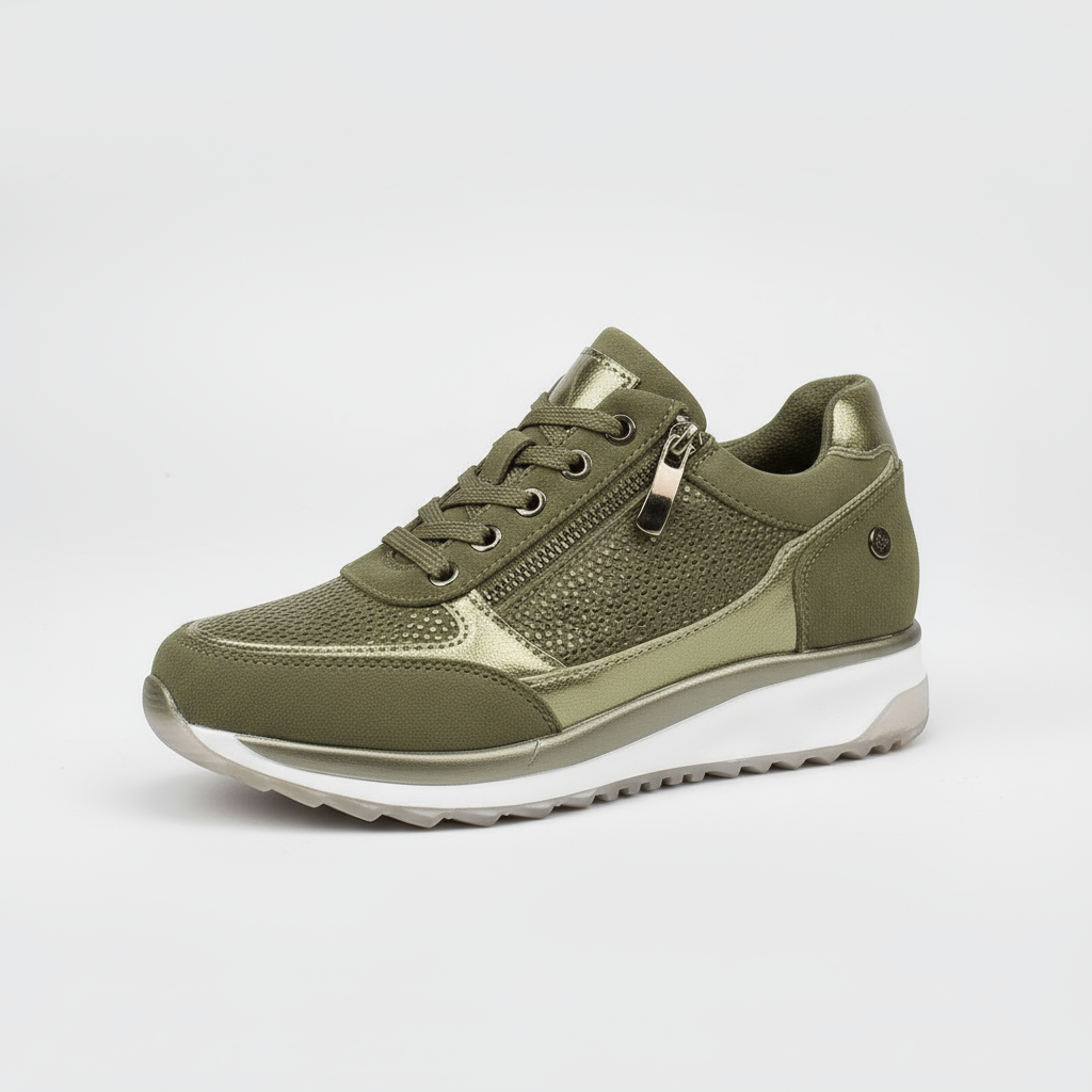 Green sneaker with a white sole on a light gray background