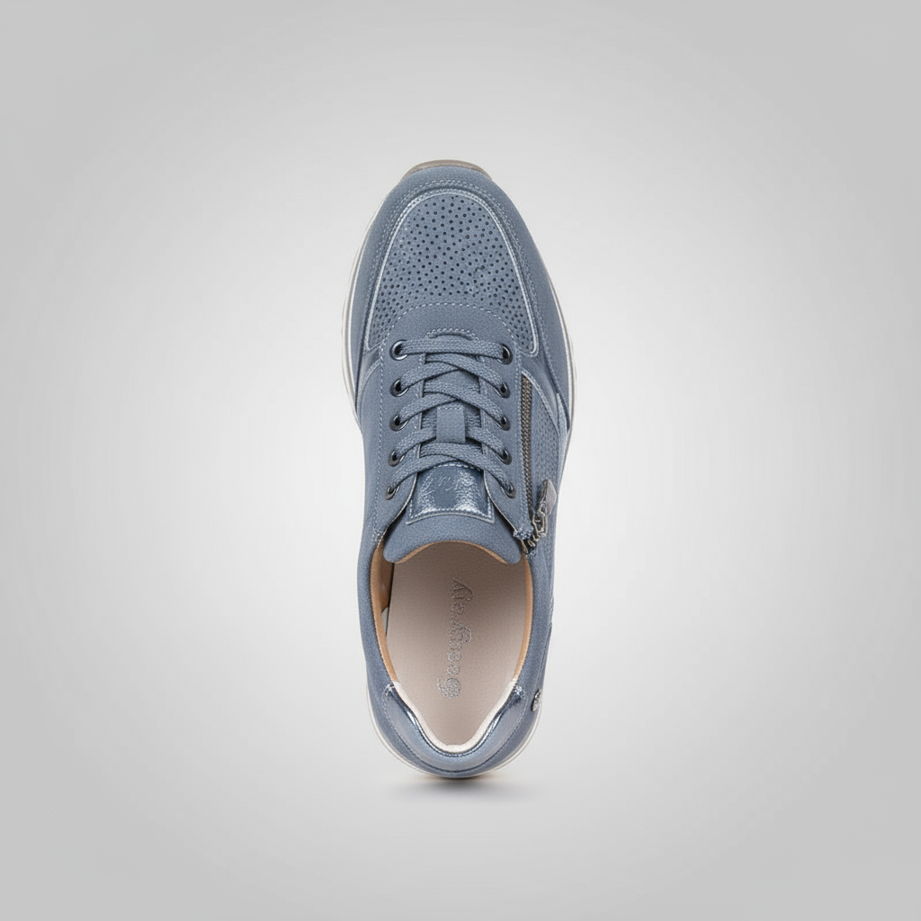 Blue sneaker on a light gray background