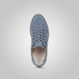 Blue sneaker on a light gray background