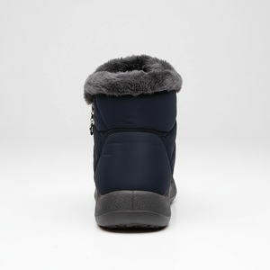 Navy winter boot with gray fur lining on a white background