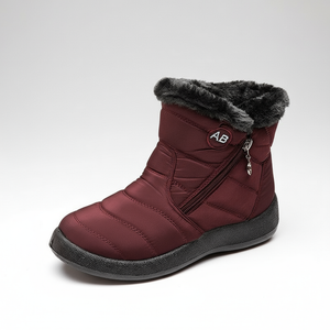 Maroon winter boot with gray fur lining on a white background