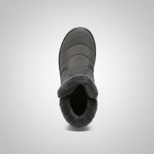 Gray winter boot with fur lining on a light gray background