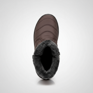 Brown winter boot with gray fur lining on a white background