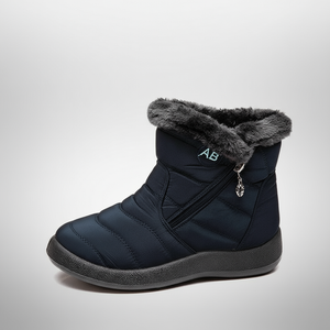 Navy blue winter boot with gray fur trim on a light gray background