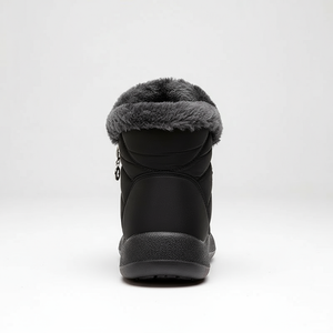 Black winter boot with gray fur lining on a white background