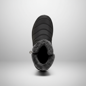 Black winter boot with gray fur lining on a light gray background