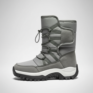 Gray winter boot with white sole on a light gray background