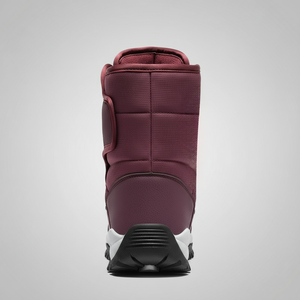 Maroon winter boot with a white sole on a white background
