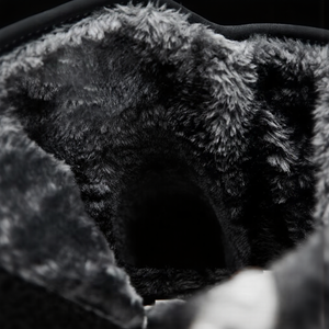 Close-up of a textured surface with a dark center
