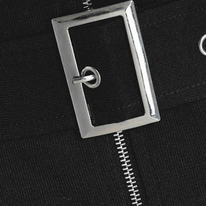 Close-up of a black jacket with a silver zipper and clasp.